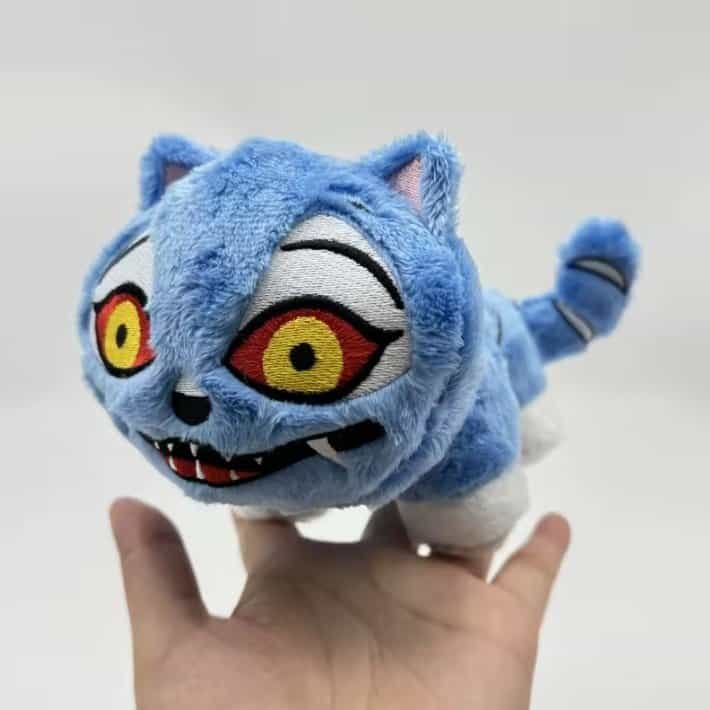 Blue plush toy of a grinning cartoonish cat with large, bright yellow eyes and black outlines, soft and cuddly, ideal for cheap high-quality merchandise.