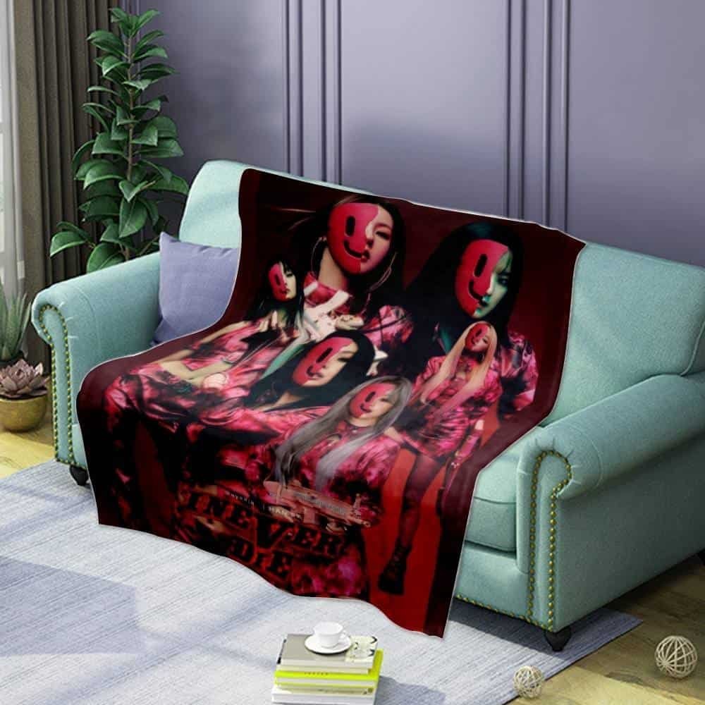 High quality cheap merch fleece blanket featuring a vibrant, artistic design of women with red masks with a fashionable, modern style for home decor.