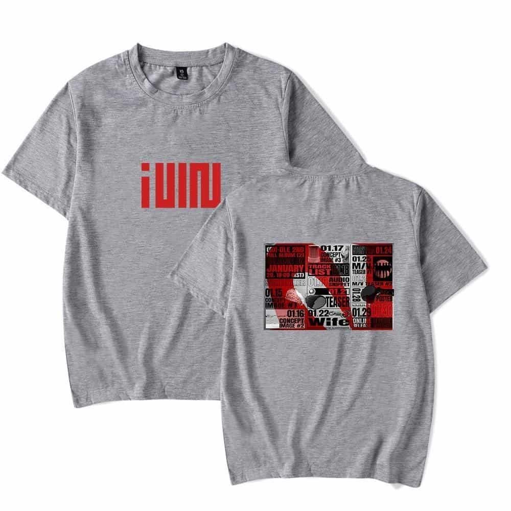 IMND text design on a grey t-shirt, featuring minimalistic and bold graphics suitable for trendy streetwear, emphasizing affordability and style.