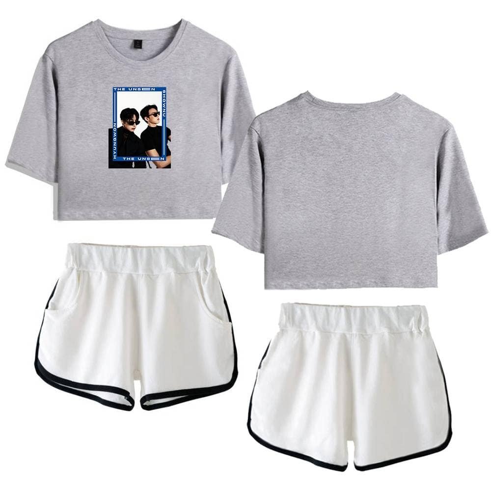 Soft gray crop tops featuring a stylish graphic print, paired with comfortable white shorts accented with black trim, perfect for affordable and high-quality casual streetwear.