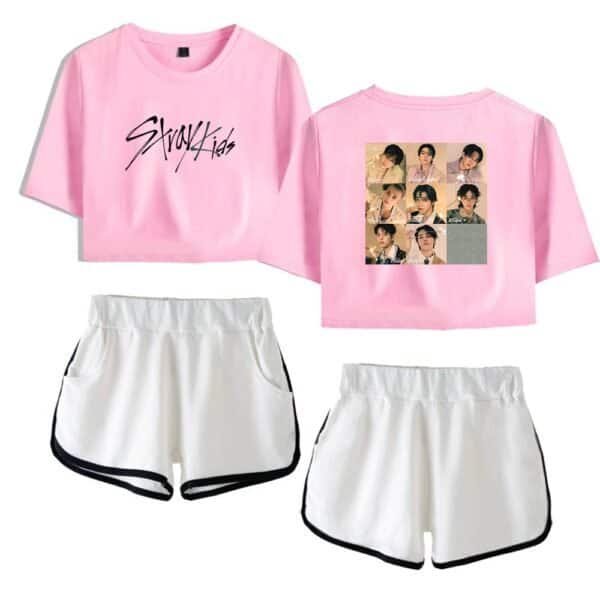 Pink Stray Kids crop top with black logo, front and back designs, paired with white athletic shorts with black trim. Perfect for casual streetwear or fan merchandise.