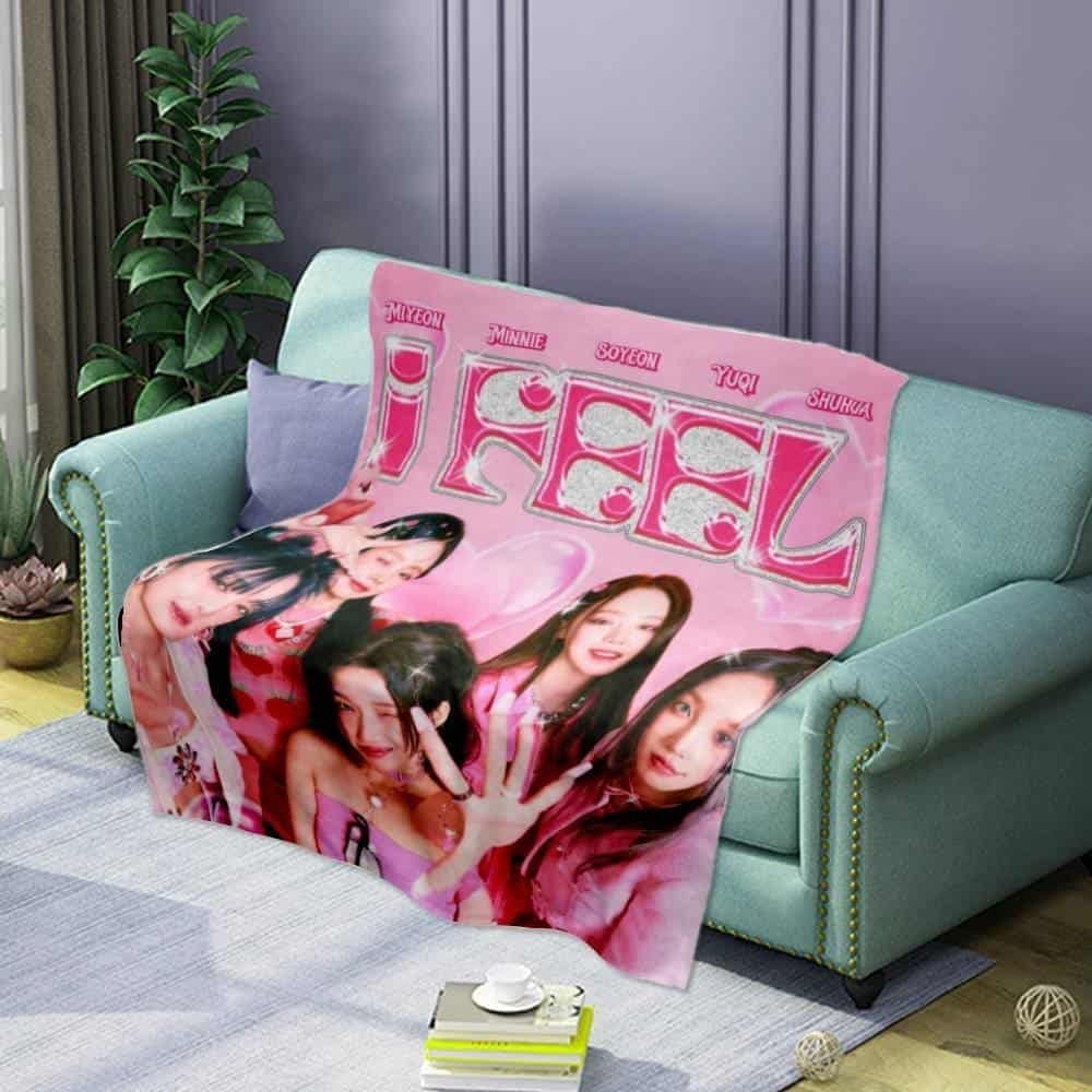 High-quality pink fan merchandise blanket featuring the girl group TWICE, perfect for fans looking for affordable and stylish decor or gifts.