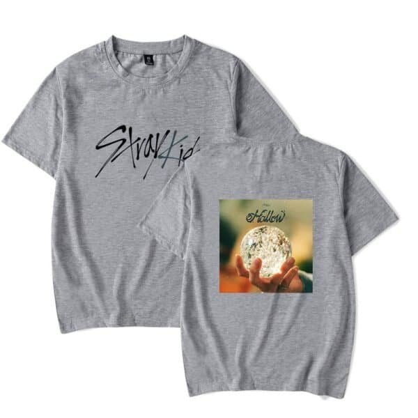 High-quality grey t-shirt with stylish graphic design and text elements, perfect for casual wear. Affordable prices make it an excellent choice for trendy, budget-friendly merchandise.