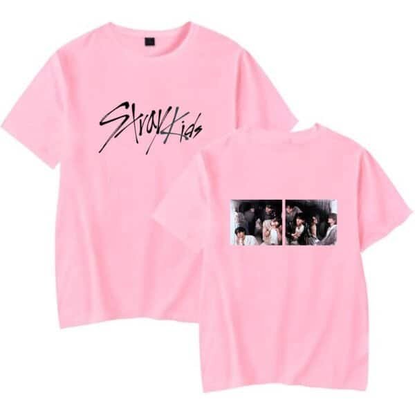 Pink graphic t-shirt with "Stray Kids" text and group photos, affordable high-quality merch.