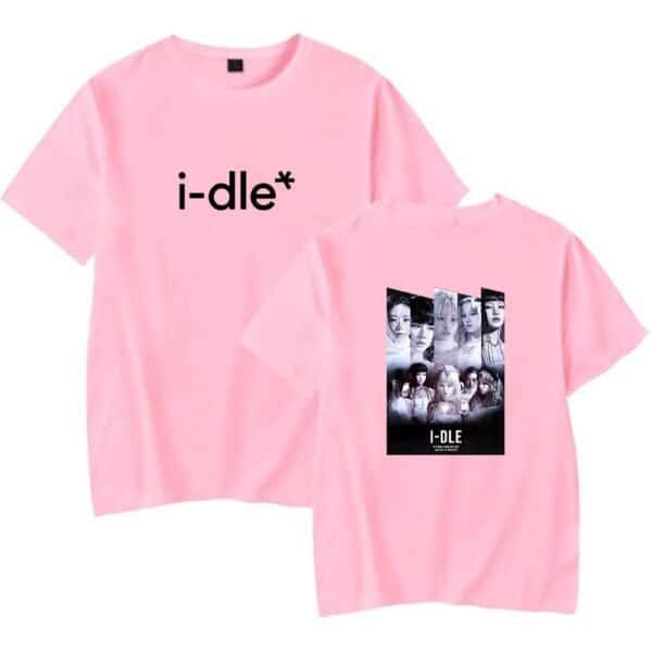 I-dle pink t-shirt with graphic design and band logo.