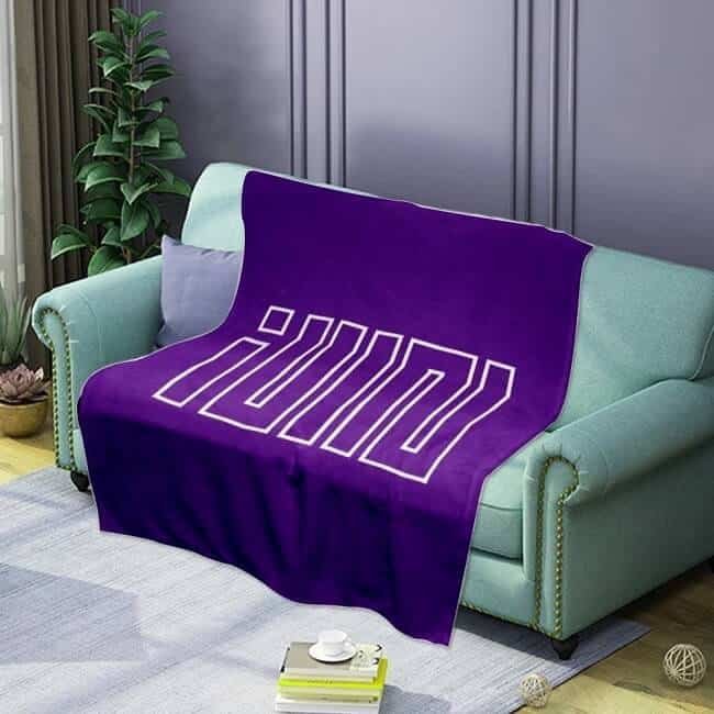 Affordable high-quality plush throw blanket with bold "MIND" print, perfect for cozy home decor or gifting. Made with soft, durable material in vibrant purple color. Ideal for relaxation and style.