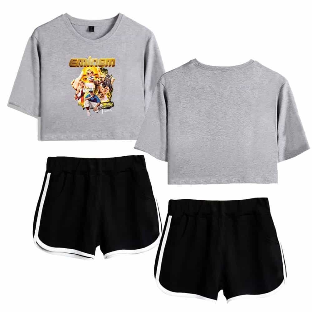 Emiderm graphic crop top with streetwear style, paired with black athletic shorts featuring white side stripes for a casual, comfortable, and trendy look. Perfect for affordable high-quality merch.