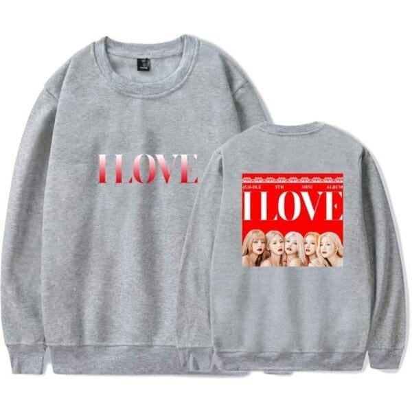 I love sweatshirt with a bold design and a picture of a K-pop girl group on the back, perfect for fans seeking affordable high-quality merchandise.