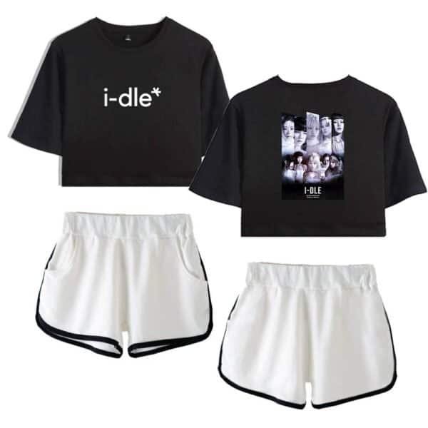 I-dle black crop top with white logo and graphic print, paired with white athletic shorts with black trim, offering affordable, high-quality merchandise for fans and fashion enthusiasts.