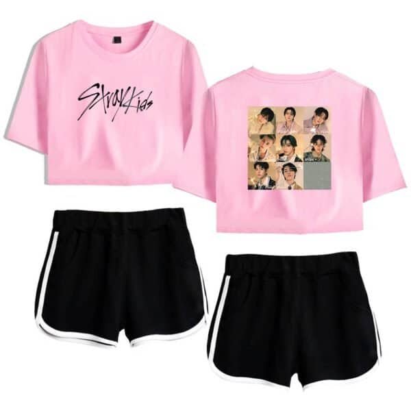 Pink cropped T-shirt with "Stray Kids" slogan on front and collage of photos of the K-pop group on back, paired with black athletic shorts with white trim. Perfect for fans seeking stylish, affordable merchandise.
