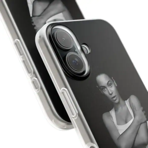 Photograph of a smartphone with a custom black and white photo case featuring a surprised woman, high-quality close-up shot.