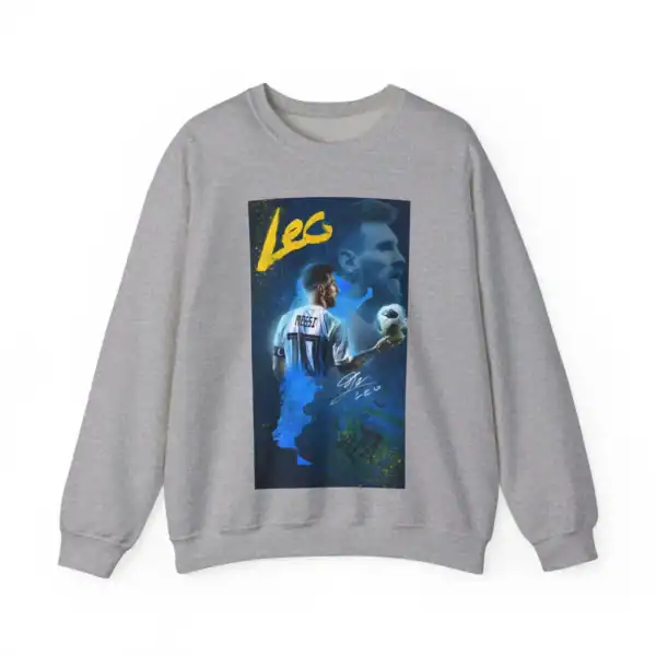 Cute gray sweatshirt featuring an artistic graphic of soccer star Lionel Messi holding a ball, with vibrant blue, yellow, and green splashes, perfect for fans looking for affordable, high-quality merch.