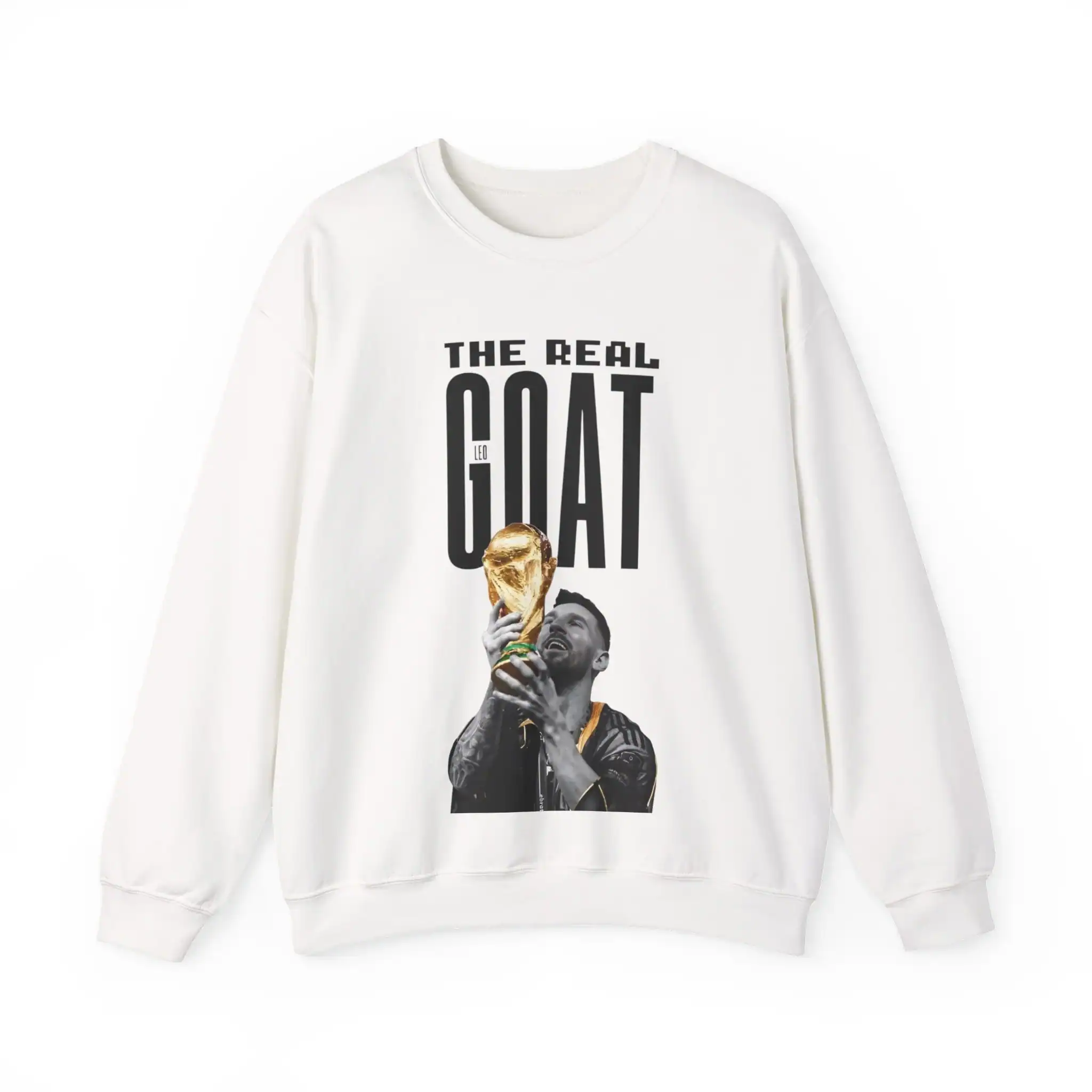 Soft white sweatshirt with a bold graphic print of a football player holding a trophy, featuring the text 'The Real GOAT', perfect for affordable, high-quality merchandise.