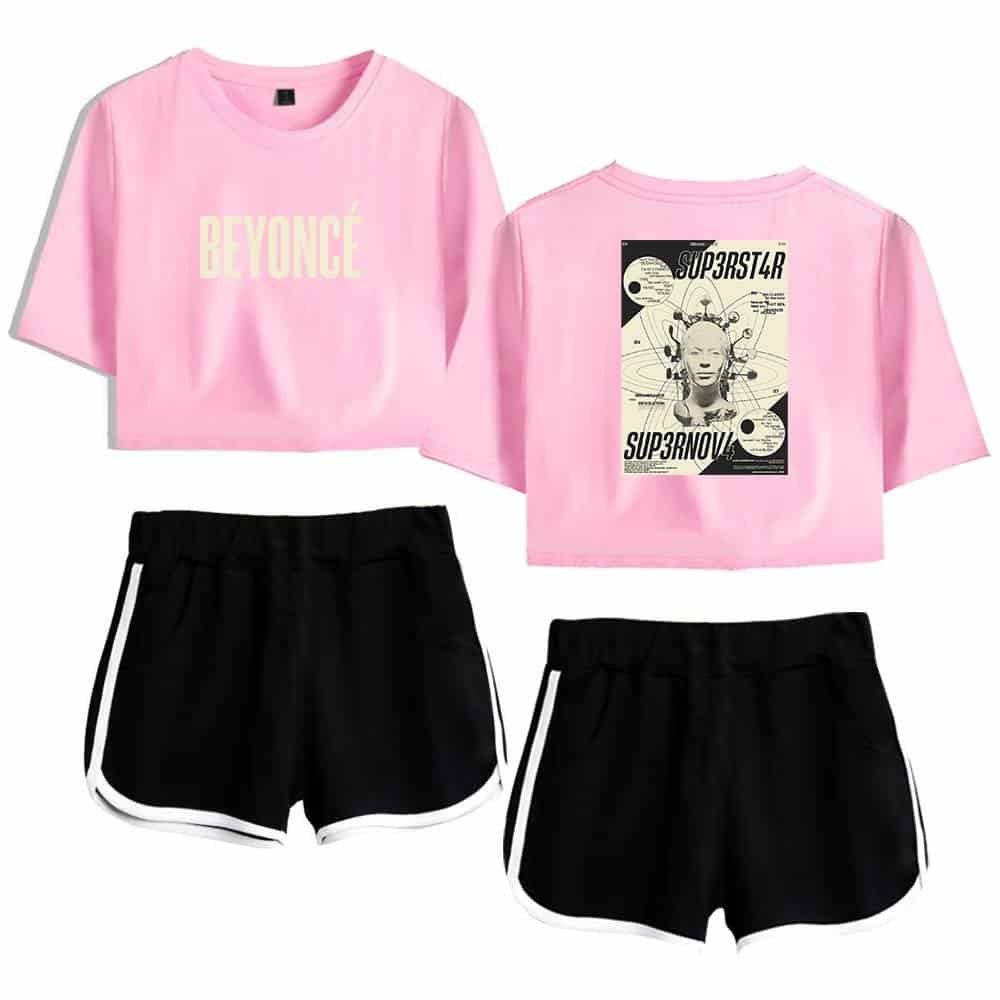 Beyonce pink crop top with graphic back design and black athletic shorts with white trim, stylish and affordable merch.
