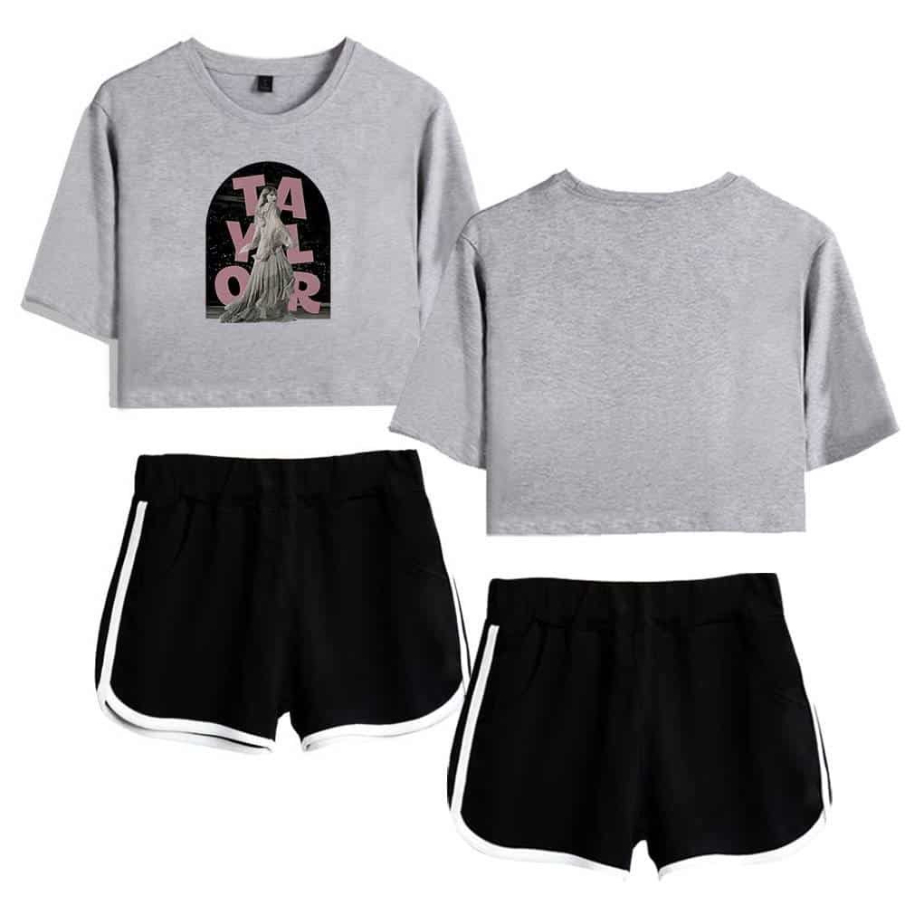 Trending affordable high-quality casual fitness set with a cropped graphic sweatshirt and comfortable running shorts for women. Perfect for stylish workouts or relaxed outings.
