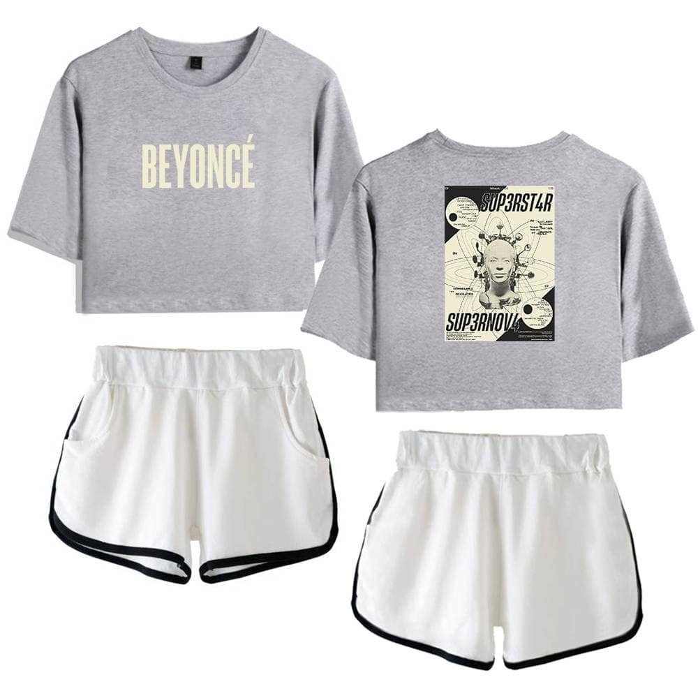 Comfy grey Beyonce crop top and graphic music star sweatshirt with sporty white shorts with black trim, affordable high-quality casual streetwear, stylish and comfortable for everyday wear.