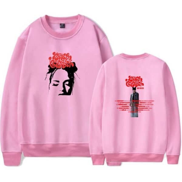 High-quality pink graphic sweatshirt featuring an artistic portrait and bold red text, perfect for stylish casual wear. Affordable and trendy, ideal for fans of unique merch designs.