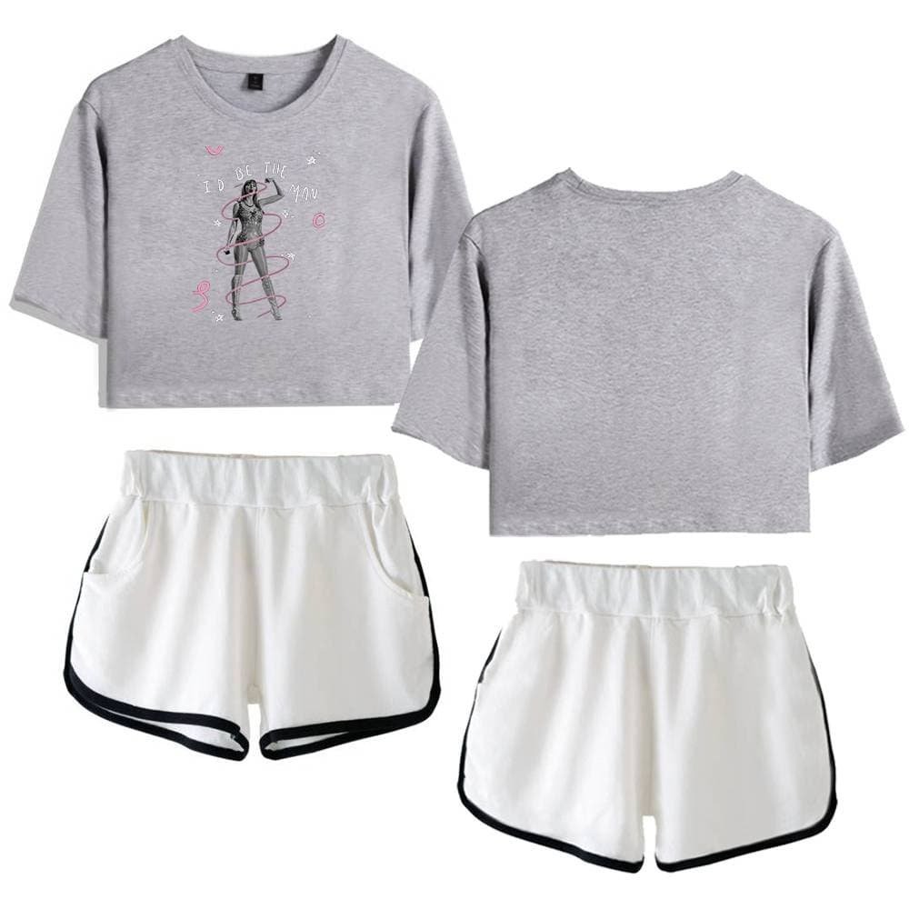Comfy grey crop top with graphic print and matching white athletic shorts with black trim, perfect for casual or athletic wear.