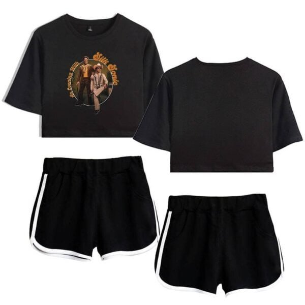 Stylish black crop top and comfortable black shorts with white trim, perfect for casual wear or workouts. Featuring a vintage-inspired graphic design on the shirt. Affordable, high-quality merchandise.