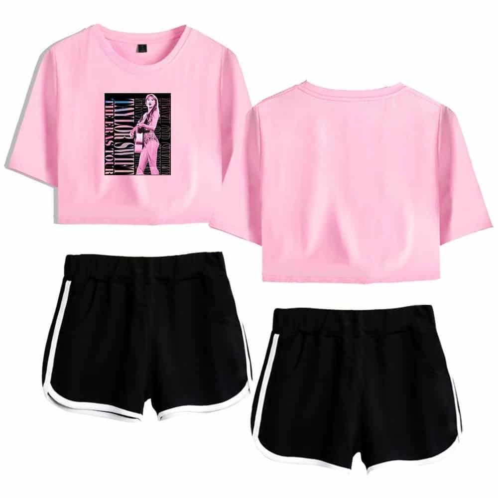 Premium quality pink crop top with graphic print and black athletic shorts with white trim, affordable and stylish for casual wear or workouts.