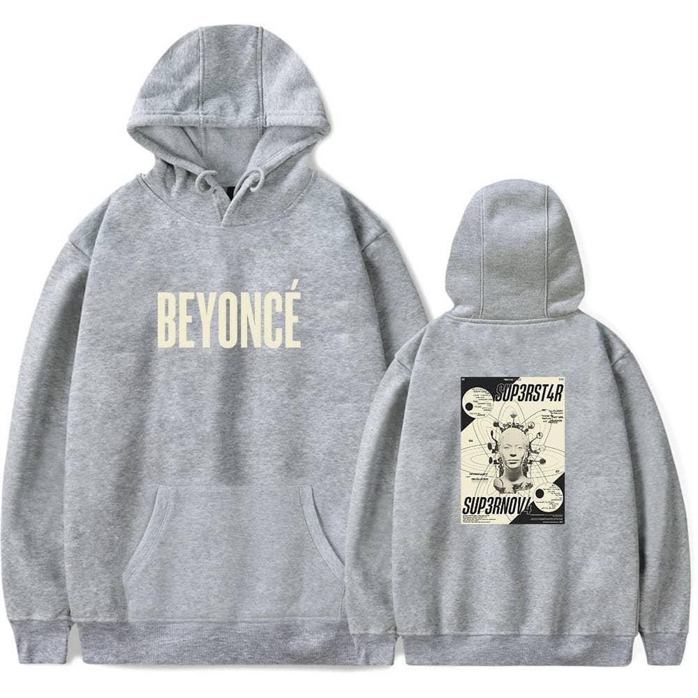 Soft grey hoodie with "BEYONCÉ" printed on the front, featuring a graphic design on the back for stylish, affordable high-quality merchandise. Perfect for fans of Beyoncé or music lovers.