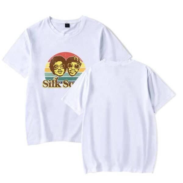 Retro style white t-shirt featuring a colorful vintage graphic of two people with the text "Silk Sonic"; affordable, high-quality merchandise for music fans.