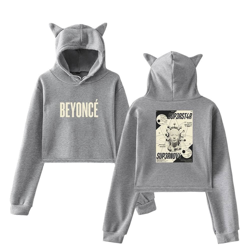 High-quality grey hoodie with cute cat ears on the hood, featuring Beyoncé text on the front and a modern, artistic graphic print on the back, perfect for stylish, affordable streetwear fashion.
