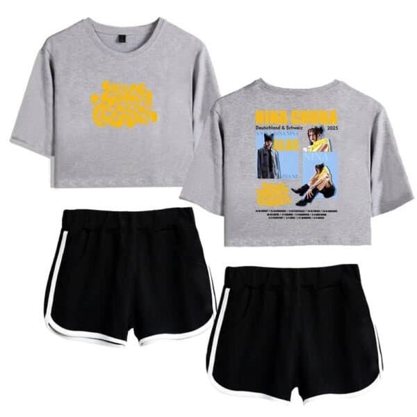 Bright grey sweatshirt with bold yellow graphic print, casual black shorts with white side stripes, trendy and affordable merch for everyday wear, high-quality materials for comfort and durability, perfect for fashion-forward individuals seeking budget-friendly options.