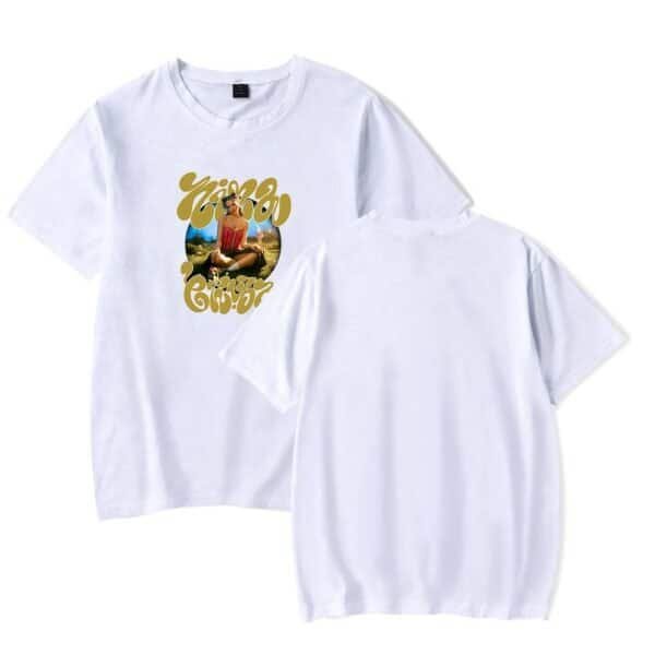 White t-shirt with colorful graphic print featuring a woman sitting outdoors and trendy gold text design, cheap high quality merch, affordable and stylish casual wear.